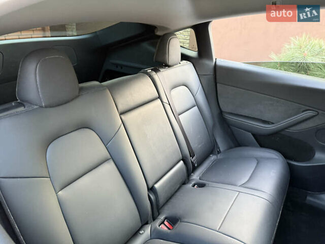 Синий Тесла Model Y, объемом двигателя 0 л и пробегом 30 тыс. км за 18100 $, фото 32 на Automoto.ua