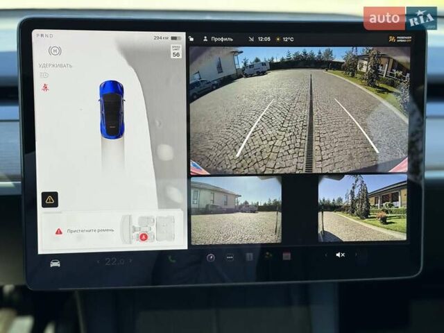 Синий Тесла Model Y, объемом двигателя 0 л и пробегом 80 тыс. км за 25300 $, фото 131 на Automoto.ua