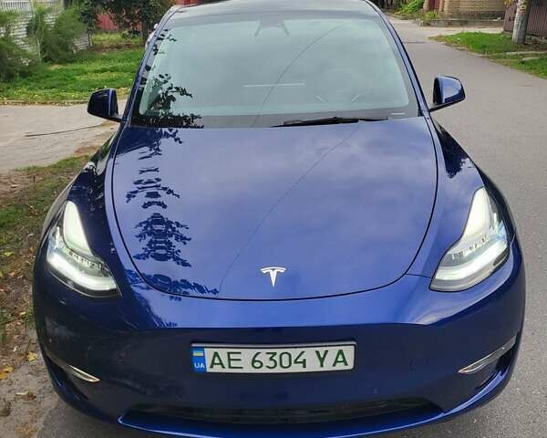 Синий Тесла Model Y, объемом двигателя 0 л и пробегом 63 тыс. км за 26500 $, фото 1 на Automoto.ua