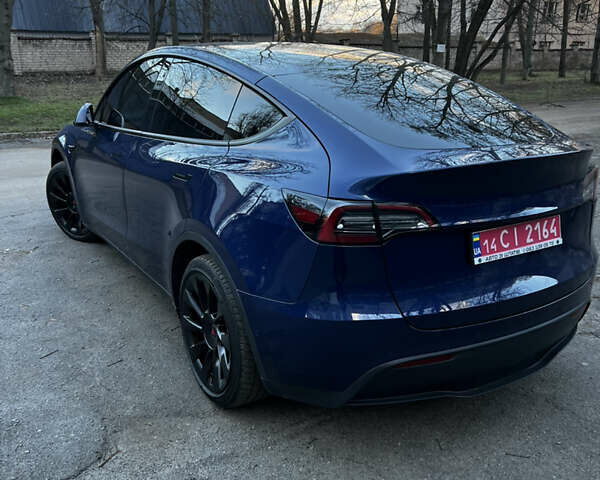 Синій Тесла Model Y, об'ємом двигуна 0 л та пробігом 76 тис. км за 23300 $, фото 7 на Automoto.ua