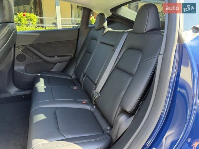 Синий Тесла Model Y, объемом двигателя 0 л и пробегом 80 тыс. км за 25300 $, фото 83 на Automoto.ua