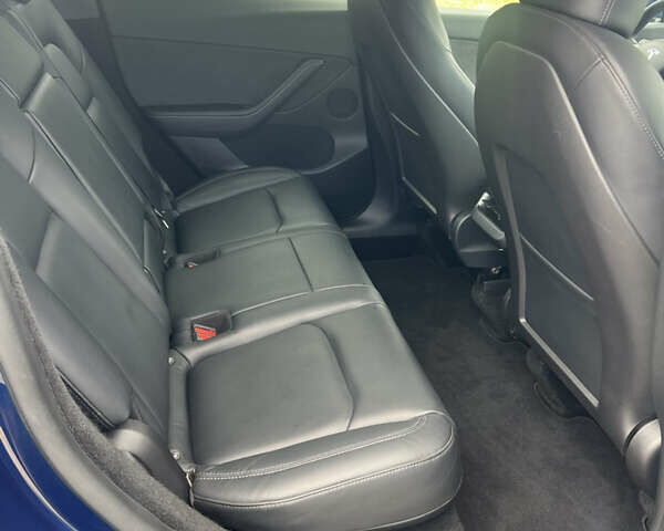 Синій Тесла Model Y, об'ємом двигуна 0 л та пробігом 91 тис. км за 23200 $, фото 18 на Automoto.ua