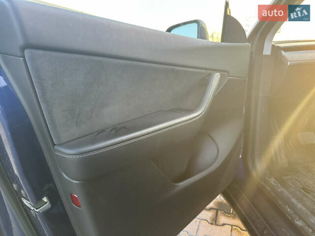 Синий Тесла Model Y, объемом двигателя 0 л и пробегом 86 тыс. км за 25000 $, фото 6 на Automoto.ua