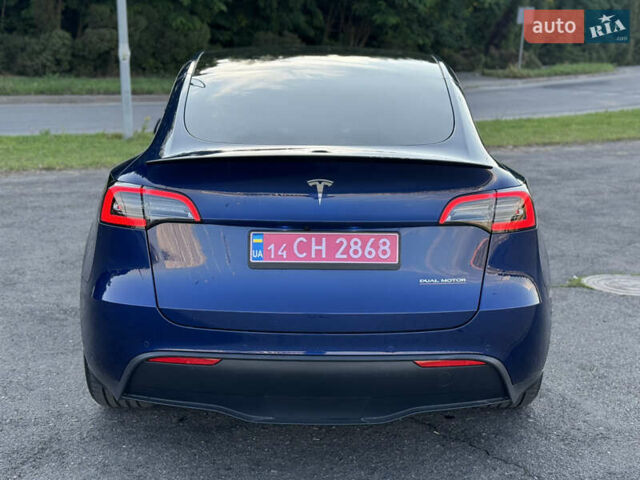 Синий Тесла Model Y, объемом двигателя 0 л и пробегом 61 тыс. км за 23800 $, фото 5 на Automoto.ua
