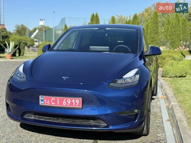 Синий Тесла Model Y, объемом двигателя 0 л и пробегом 80 тыс. км за 25300 $, фото 48 на Automoto.ua