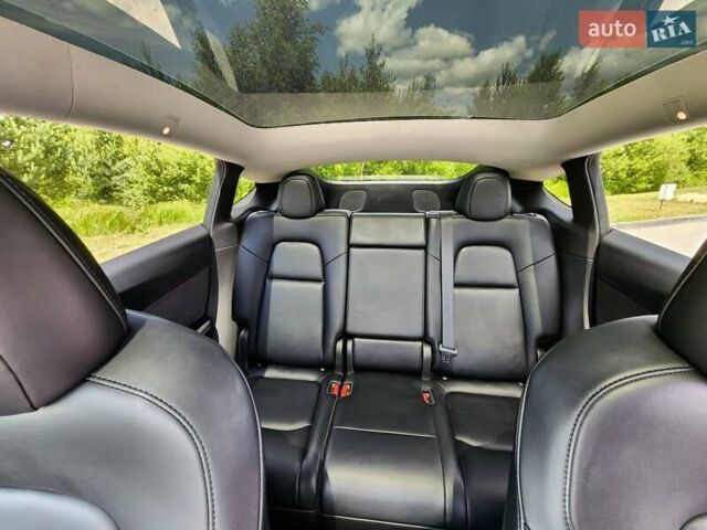 Синий Тесла Model Y, объемом двигателя 0 л и пробегом 37 тыс. км за 25900 $, фото 25 на Automoto.ua