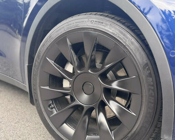 Синий Тесла Model Y, объемом двигателя 0 л и пробегом 52 тыс. км за 30900 $, фото 42 на Automoto.ua