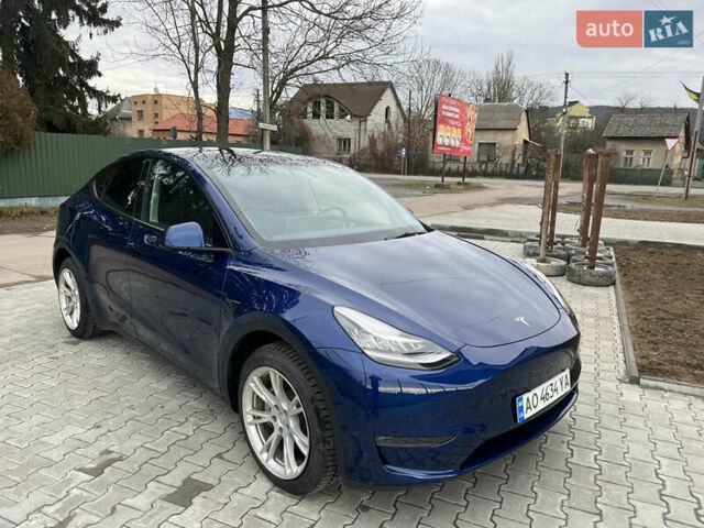 Синий Тесла Model Y, объемом двигателя 0 л и пробегом 86 тыс. км за 24900 $, фото 1 на Automoto.ua