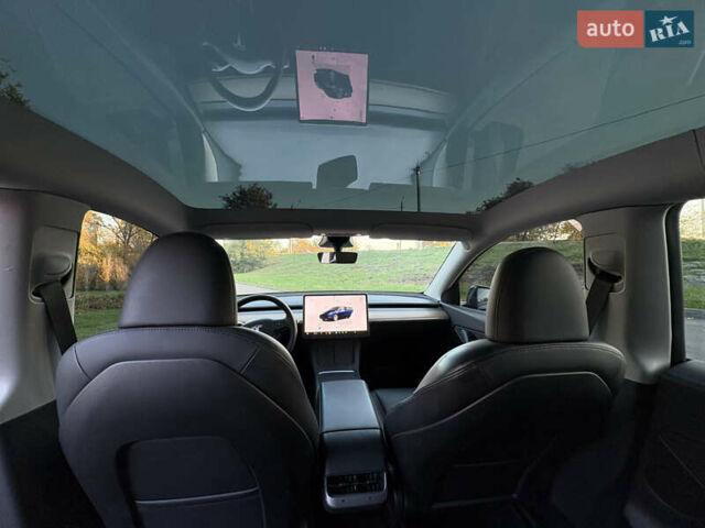 Синий Тесла Model Y, объемом двигателя 0 л и пробегом 42 тыс. км за 24500 $, фото 14 на Automoto.ua