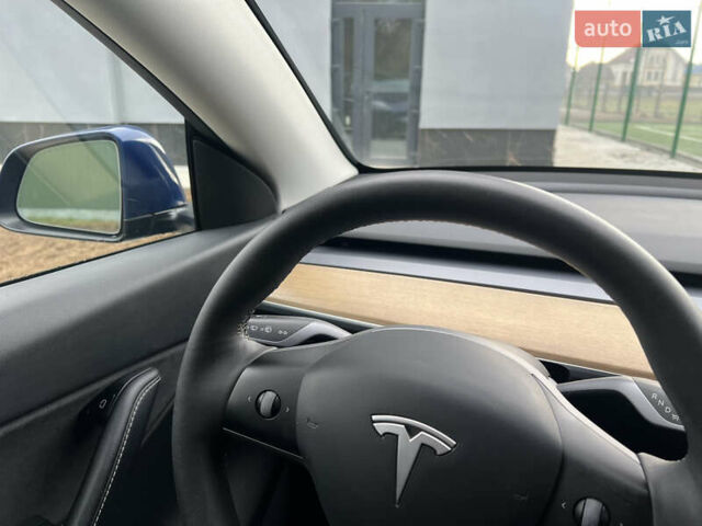 Синий Тесла Model Y, объемом двигателя 0 л и пробегом 86 тыс. км за 24900 $, фото 23 на Automoto.ua