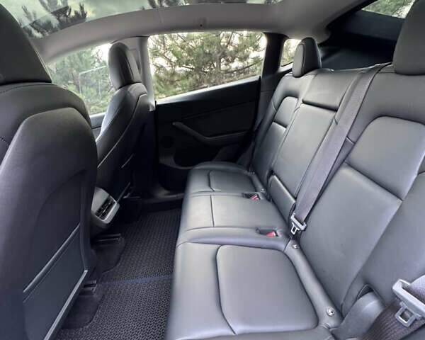 Синий Тесла Model Y, объемом двигателя 0 л и пробегом 52 тыс. км за 30900 $, фото 22 на Automoto.ua