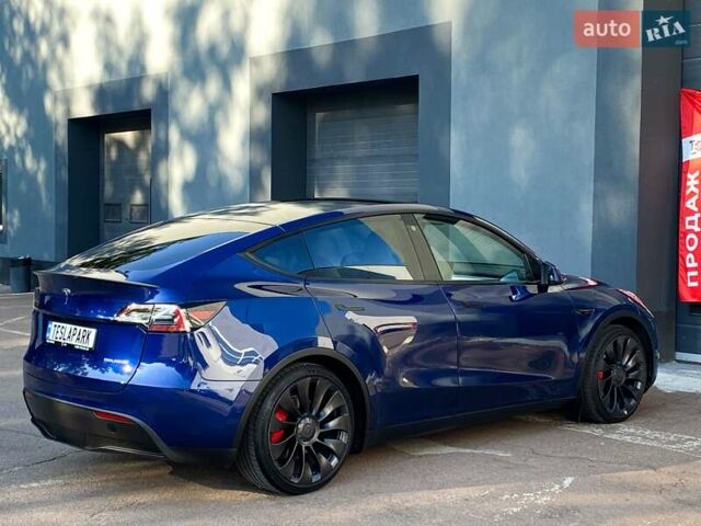 Синий Тесла Model Y, объемом двигателя 0 л и пробегом 92 тыс. км за 31999 $, фото 9 на Automoto.ua