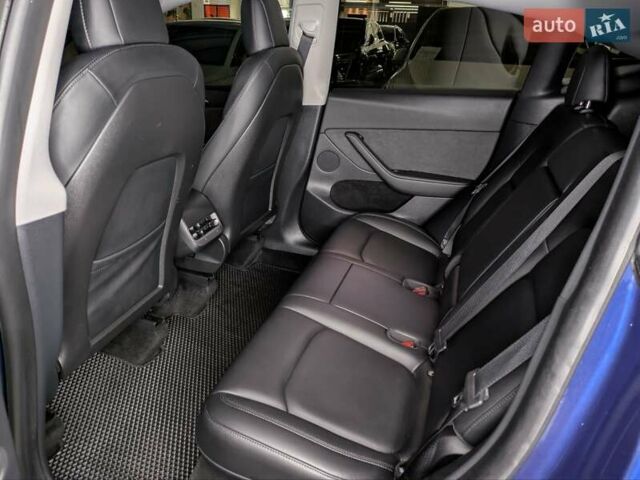 Синий Тесла Model Y, объемом двигателя 0 л и пробегом 51 тыс. км за 30900 $, фото 28 на Automoto.ua