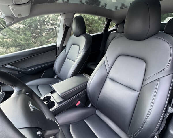 Синий Тесла Model Y, объемом двигателя 0 л и пробегом 52 тыс. км за 30900 $, фото 23 на Automoto.ua