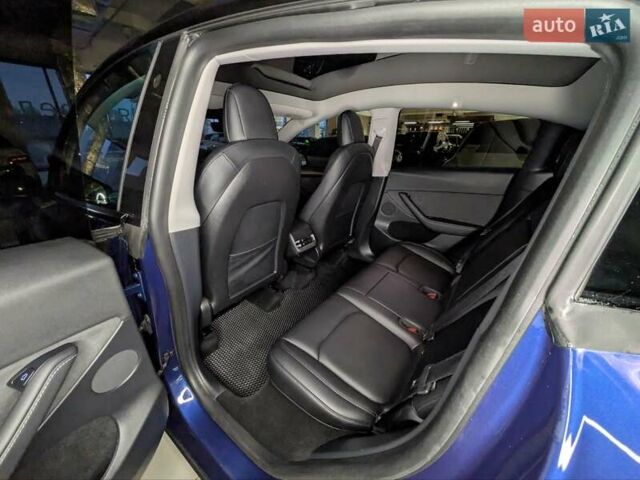 Синий Тесла Model Y, объемом двигателя 0 л и пробегом 51 тыс. км за 30900 $, фото 30 на Automoto.ua