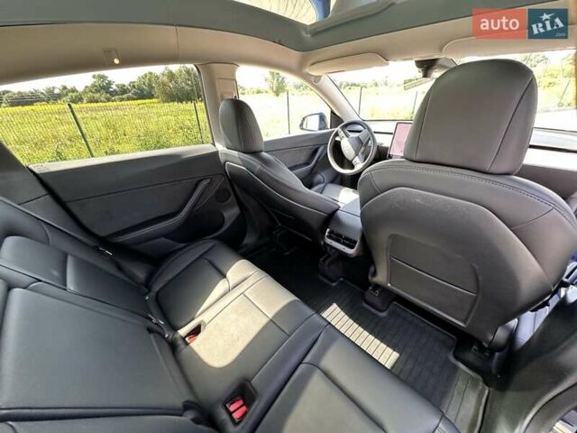 Синий Тесла Model Y, объемом двигателя 0 л и пробегом 48 тыс. км за 26700 $, фото 25 на Automoto.ua