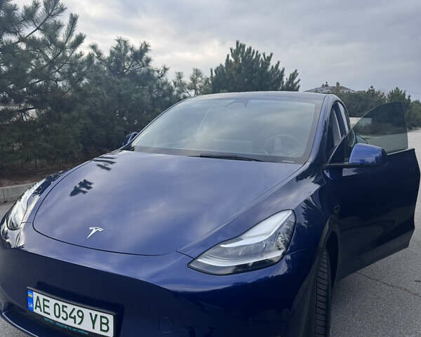 Синий Тесла Model Y, объемом двигателя 0 л и пробегом 52 тыс. км за 30900 $, фото 52 на Automoto.ua