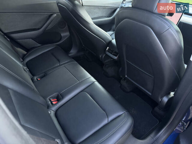 Синий Тесла Model Y, объемом двигателя 0 л и пробегом 61 тыс. км за 23800 $, фото 12 на Automoto.ua
