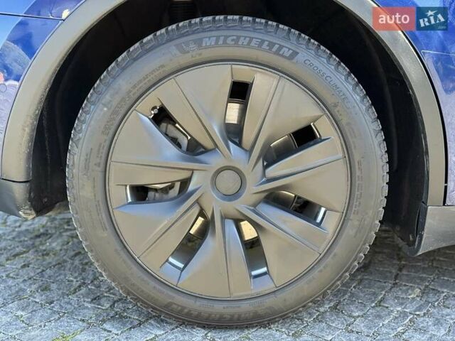 Синий Тесла Model Y, объемом двигателя 0 л и пробегом 80 тыс. км за 25300 $, фото 51 на Automoto.ua