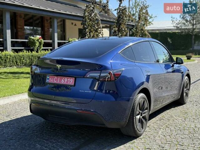 Синий Тесла Model Y, объемом двигателя 0 л и пробегом 80 тыс. км за 25300 $, фото 6 на Automoto.ua