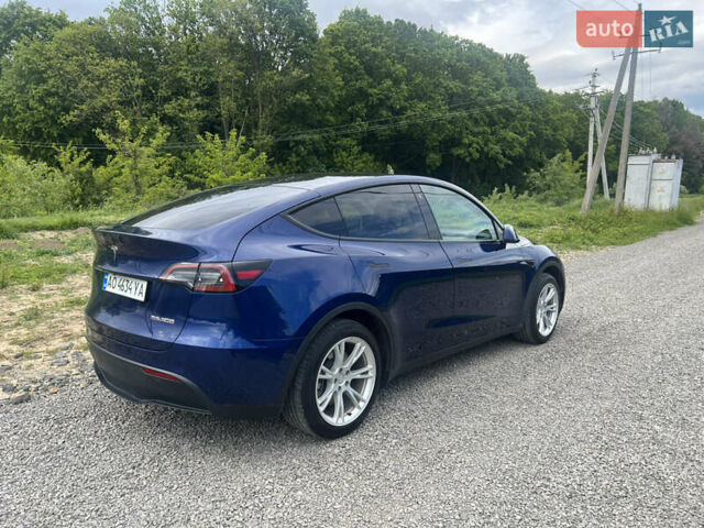 Синій Тесла Model Y, об'ємом двигуна 0 л та пробігом 91 тис. км за 23200 $, фото 7 на Automoto.ua