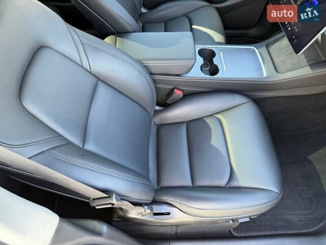 Синий Тесла Model Y, объемом двигателя 0 л и пробегом 80 тыс. км за 25300 $, фото 93 на Automoto.ua
