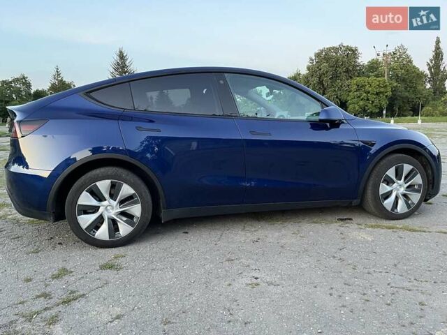 Синий Тесла Model Y, объемом двигателя 0 л и пробегом 27 тыс. км за 33300 $, фото 1 на Automoto.ua
