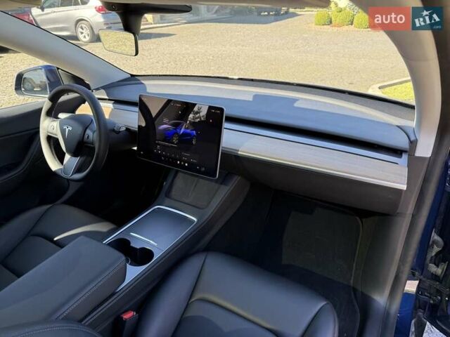 Синий Тесла Model Y, объемом двигателя 0 л и пробегом 80 тыс. км за 25300 $, фото 96 на Automoto.ua