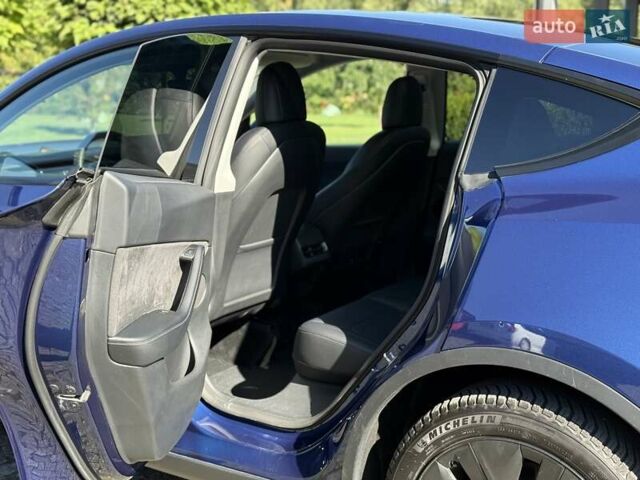 Синий Тесла Model Y, объемом двигателя 0 л и пробегом 80 тыс. км за 25300 $, фото 80 на Automoto.ua