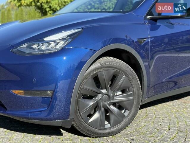 Синий Тесла Model Y, объемом двигателя 0 л и пробегом 80 тыс. км за 25300 $, фото 14 на Automoto.ua