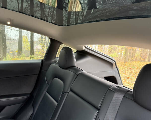 Синий Тесла Model Y, объемом двигателя 0 л и пробегом 133 тыс. км за 23900 $, фото 14 на Automoto.ua