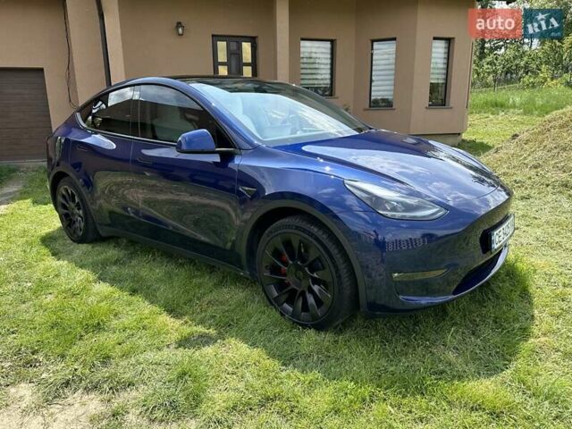 Синий Тесла Model Y, объемом двигателя 0 л и пробегом 45 тыс. км за 25990 $, фото 1 на Automoto.ua
