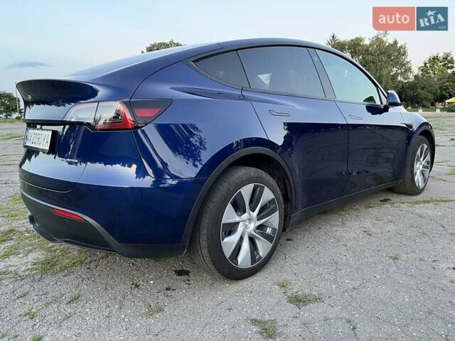 Синий Тесла Model Y, объемом двигателя 0 л и пробегом 27 тыс. км за 33300 $, фото 2 на Automoto.ua