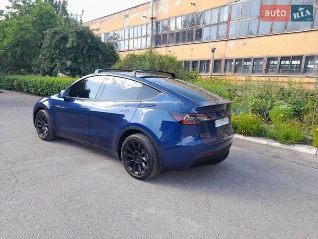 Синий Тесла Model Y, объемом двигателя 0 л и пробегом 44 тыс. км за 28000 $, фото 2 на Automoto.ua