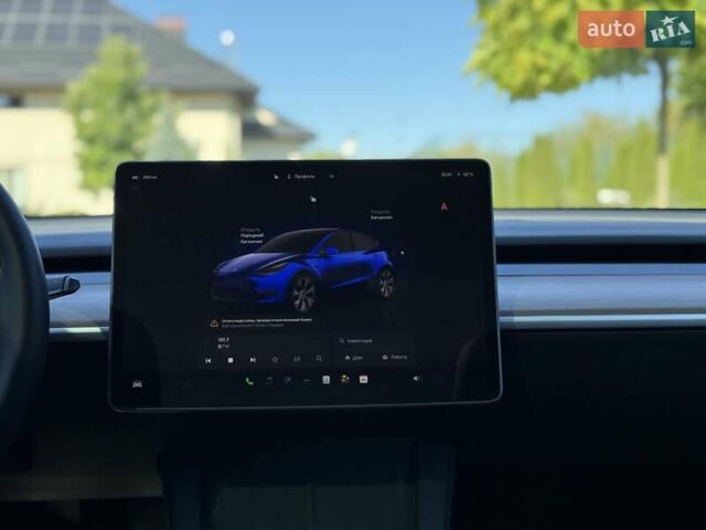 Синий Тесла Model Y, объемом двигателя 0 л и пробегом 80 тыс. км за 25300 $, фото 109 на Automoto.ua
