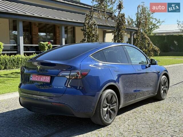 Синий Тесла Model Y, объемом двигателя 0 л и пробегом 80 тыс. км за 25300 $, фото 5 на Automoto.ua