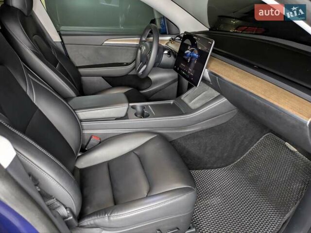 Синий Тесла Model Y, объемом двигателя 0 л и пробегом 51 тыс. км за 30900 $, фото 42 на Automoto.ua