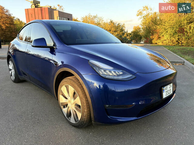 Синий Тесла Model Y, объемом двигателя 0 л и пробегом 42 тыс. км за 24500 $, фото 2 на Automoto.ua