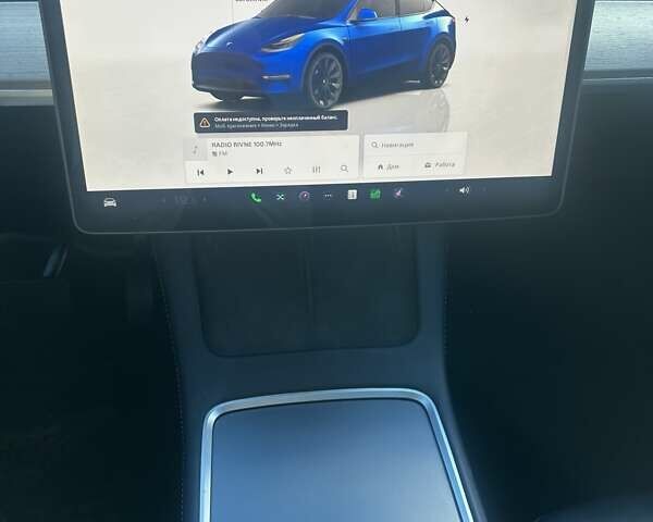 Синий Тесла Model Y, объемом двигателя 0 л и пробегом 93 тыс. км за 25500 $, фото 5 на Automoto.ua