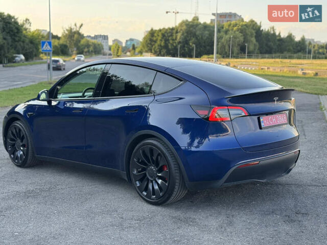 Синий Тесла Model Y, объемом двигателя 0 л и пробегом 61 тыс. км за 23800 $, фото 4 на Automoto.ua