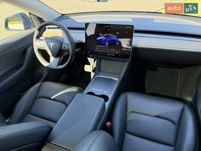 Синий Тесла Model Y, объемом двигателя 0 л и пробегом 80 тыс. км за 25300 $, фото 105 на Automoto.ua