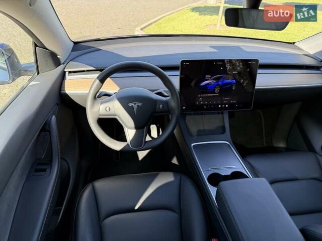 Синий Тесла Model Y, объемом двигателя 0 л и пробегом 80 тыс. км за 25300 $, фото 102 на Automoto.ua