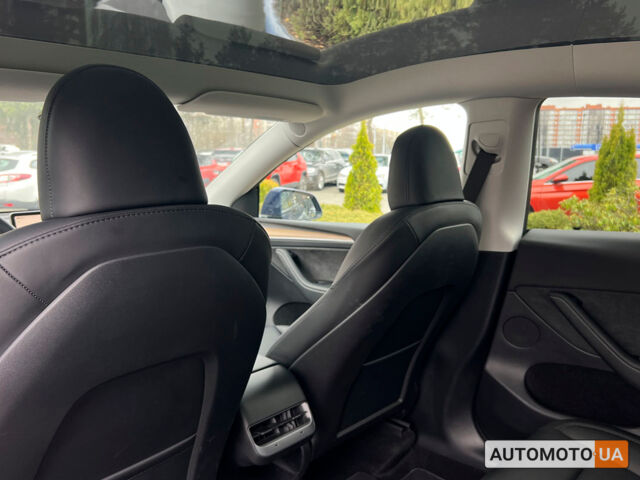 Синий Тесла Model Y, объемом двигателя 82 л и пробегом 17 тыс. км за 34600 $, фото 12 на Automoto.ua