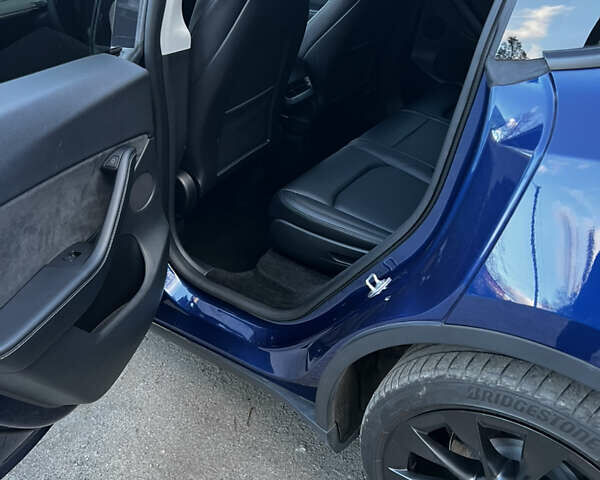 Синій Тесла Model Y, об'ємом двигуна 0 л та пробігом 76 тис. км за 23300 $, фото 15 на Automoto.ua