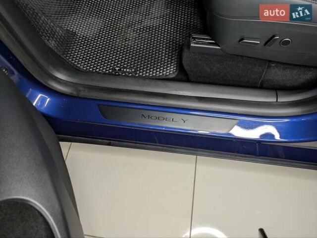 Синий Тесла Model Y, объемом двигателя 0 л и пробегом 51 тыс. км за 30900 $, фото 16 на Automoto.ua