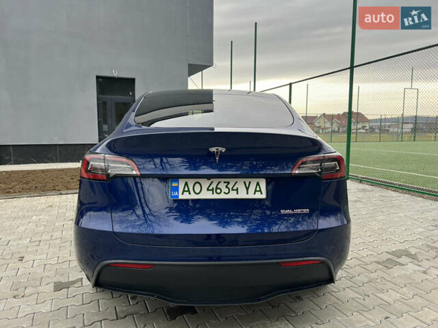 Синий Тесла Model Y, объемом двигателя 0 л и пробегом 86 тыс. км за 24900 $, фото 5 на Automoto.ua