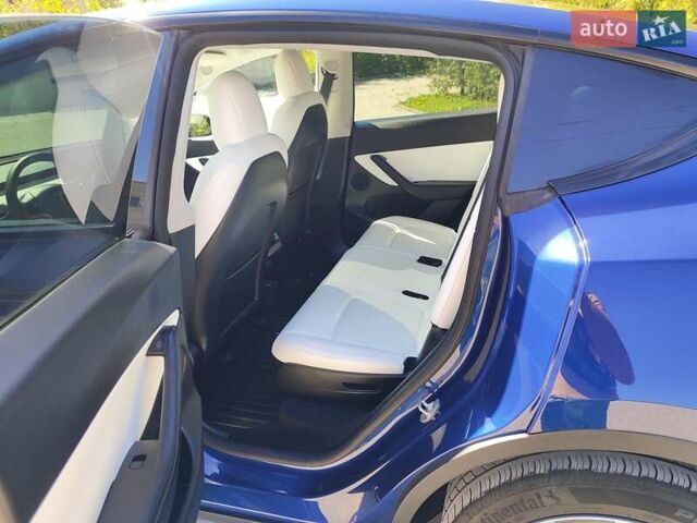 Синий Тесла Model Y, объемом двигателя 0 л и пробегом 63 тыс. км за 26800 $, фото 2 на Automoto.ua