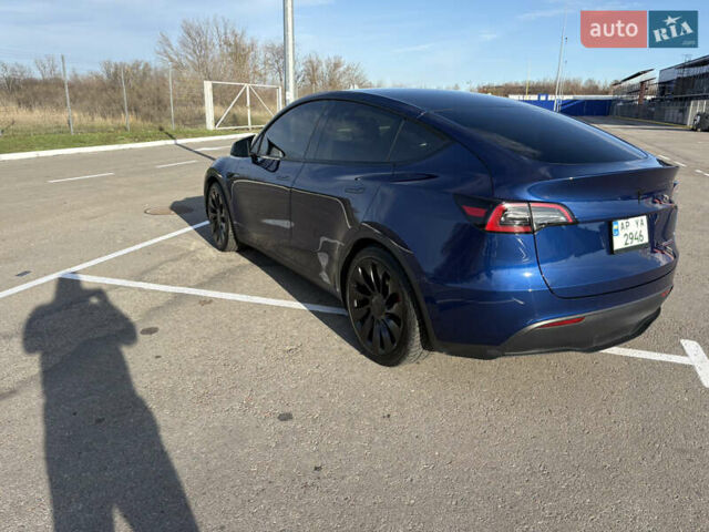 Синій Тесла Model Y, об'ємом двигуна 0 л та пробігом 76 тис. км за 27000 $, фото 2 на Automoto.ua