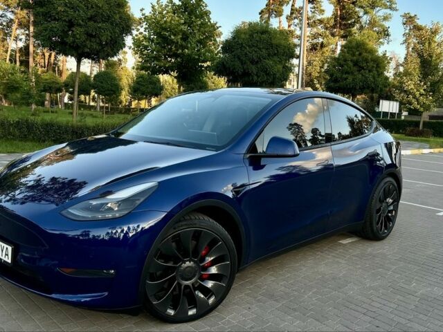 Синий Тесла Model Y, объемом двигателя 0 л и пробегом 84 тыс. км за 26900 $, фото 2 на Automoto.ua
