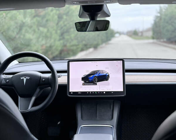 Синий Тесла Model Y, объемом двигателя 0 л и пробегом 52 тыс. км за 30900 $, фото 31 на Automoto.ua
